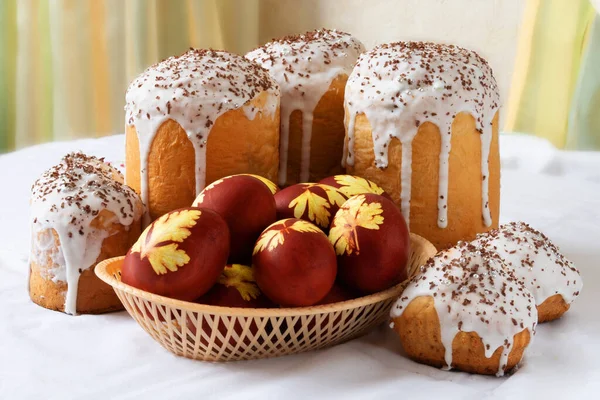 Orthodox Easter. Easter cakes and colored eggs on table. Traditional Kulich, Paska Easter Bread. Side view