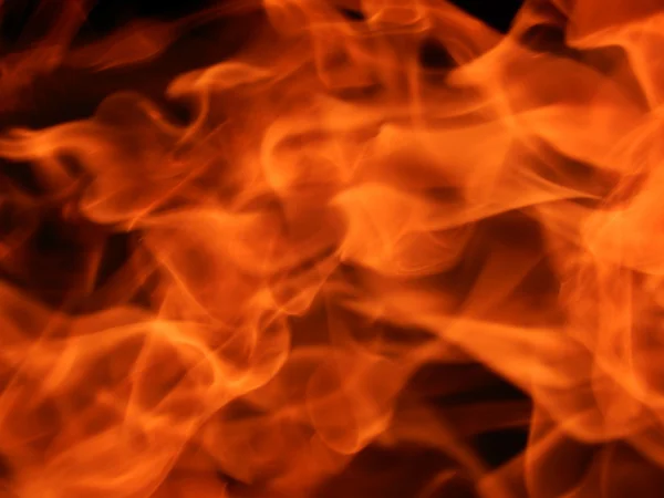 The texture of a flame of fire on a black background Stock Image