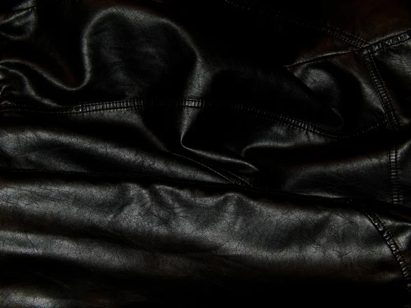 Textura de couro preto genuíno close-up — Fotografia de Stock