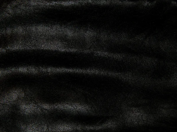 Textura de cuero negro genuino de cerca — Foto de Stock