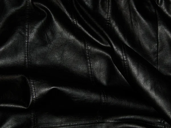 Textura de couro preto genuíno close-up — Fotografia de Stock