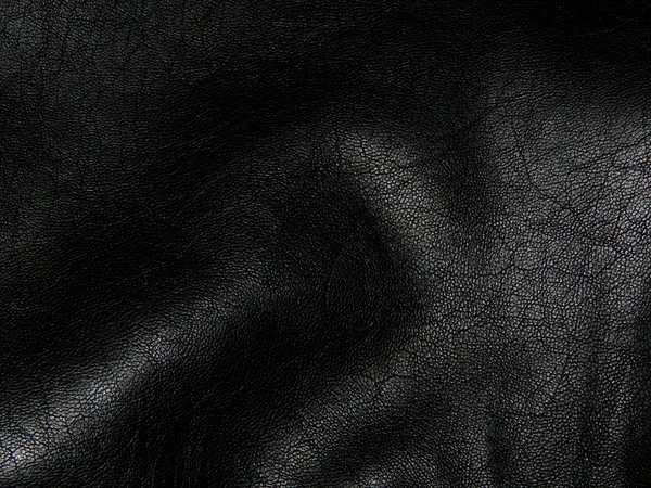 Texture of genuine black leather close up — Stock Photo, Image