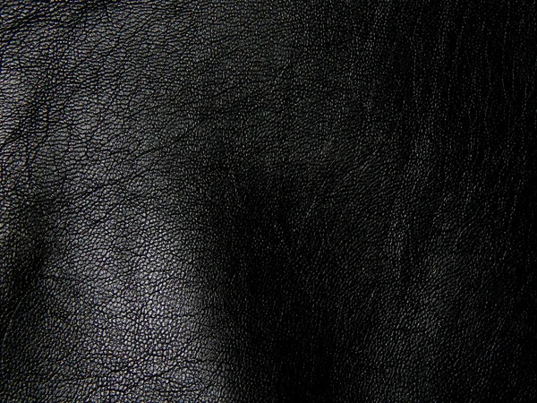 La texture du cuir véritable noir en gros plan — Photo