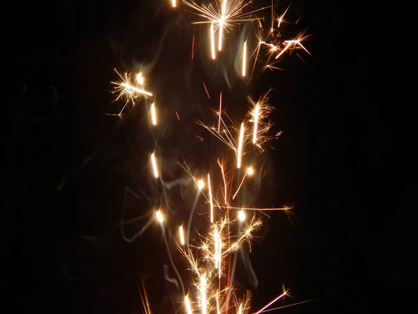 Sparkler com um pouco de fumo — Fotografia de Stock