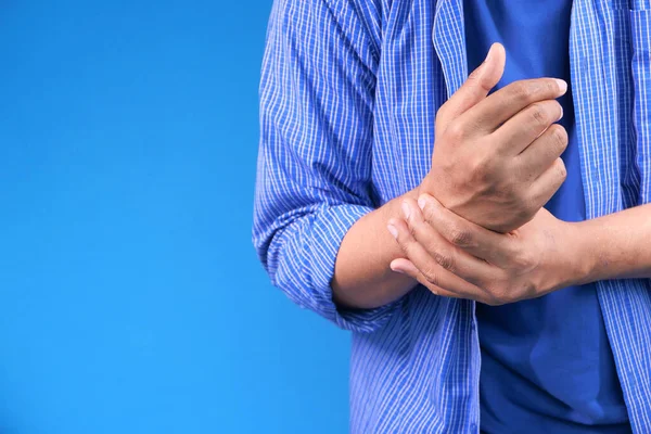 Man suffering pain in hand close up — Stock Photo, Image