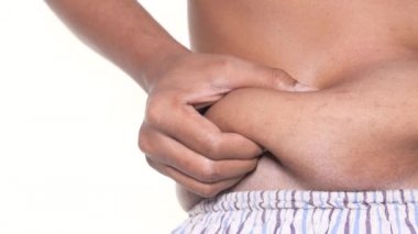 Erkeklerin el ele tutuşması aşırı göbek yağları, aşırı kilolu kavramlar