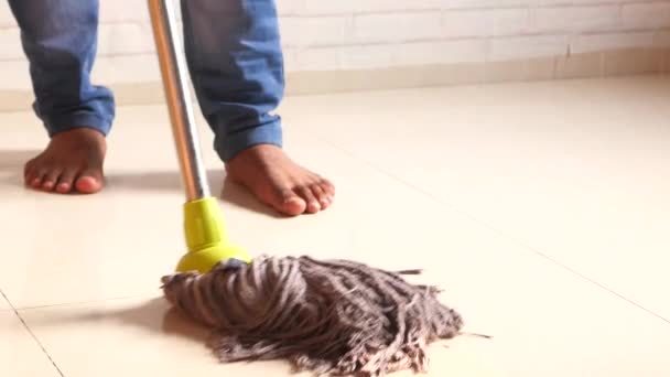 Cleaning tiles floor with mop — Stock Video