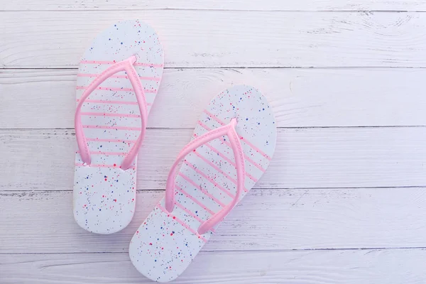 Colorful sandals on white background top down — Stock Photo, Image