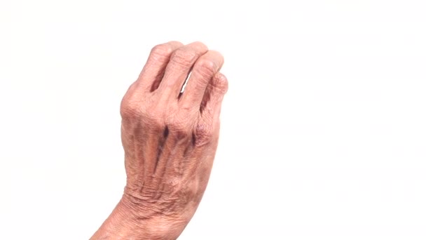 Close up of hand of a elderly person isolated on white — Stock Video