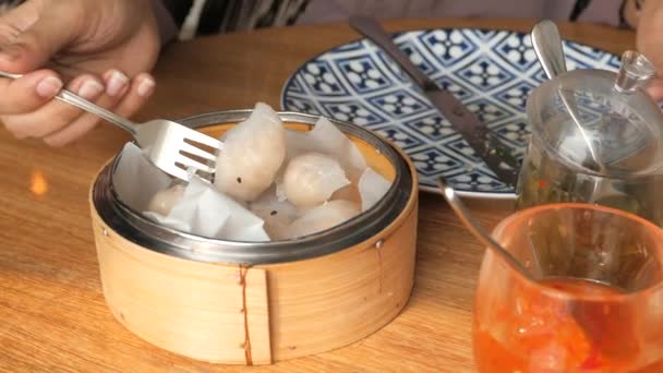 Close up of steamed dim sum in a bowl — Stock Video