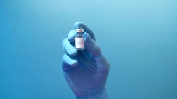 Guanti di lattice muniti di vaccino coronavirico, con spazio per la copia — Video Stock