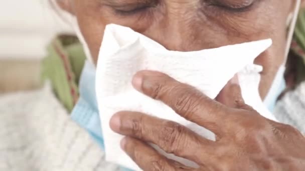 Senior women man with flu blow nose with napkin. — Stock Video