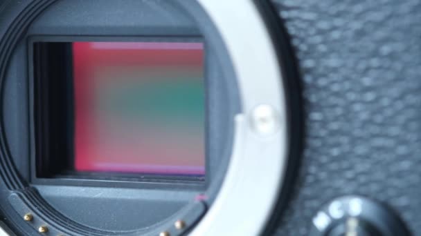 Close up of digital camera sensor on table. — Stock Video