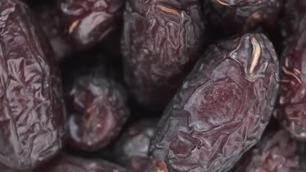 Close up of fresh date fruit in a bowl on table — Stock Video
