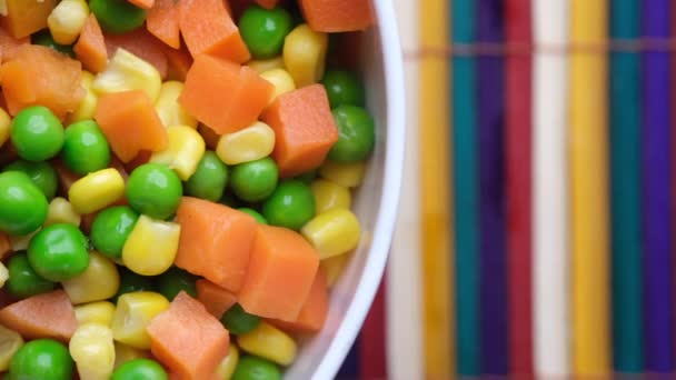 Close up of corn, carrot and beans in a bowl, — Stock Video