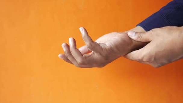 Man suffering pain in hand close up — Stock Video