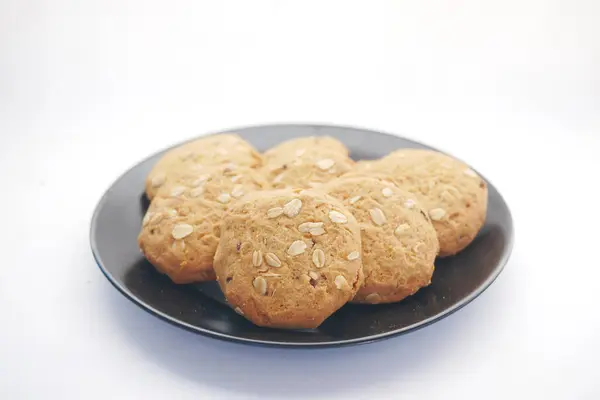 Close up of sweet cookies on white background — Stock Photo, Image