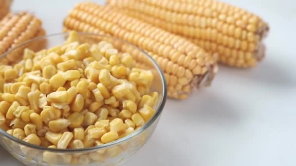 Sweet corns in a bowl on white background , — Stok Video