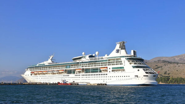 Royal Caribbean cruise ship, Rhapsody of the Seas, moored in Argostoli, on the Greek island of Kefalonia.  The cruise ship entered service in 2000.