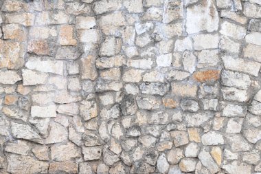 Taş duvar dokusu fotoğrafı. Eski antik taşlar. Gri renk.