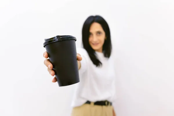 Happy Caucasian Woman Smart Clothes Shows Black Disposable Coffee Paper — Stock Photo, Image