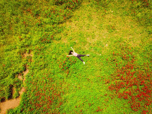 Aerial Top View Young Caucasian Woman Lay Green Field Joyful — Stockfoto