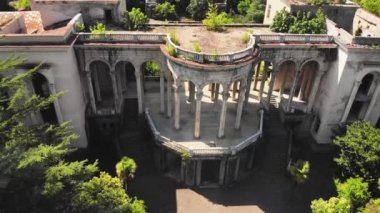 The ruins old Soviet sanatorium Medea, architecture which is a synthesis of Stalinist period classical style and of Georgian ethnic decor with Gothic and Roman features
