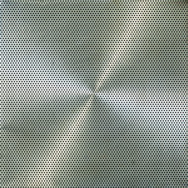 Background texture of the retro soviet perforated aluminum metal plate. Square photo with glare from light on a metal surface with many small circular holes.