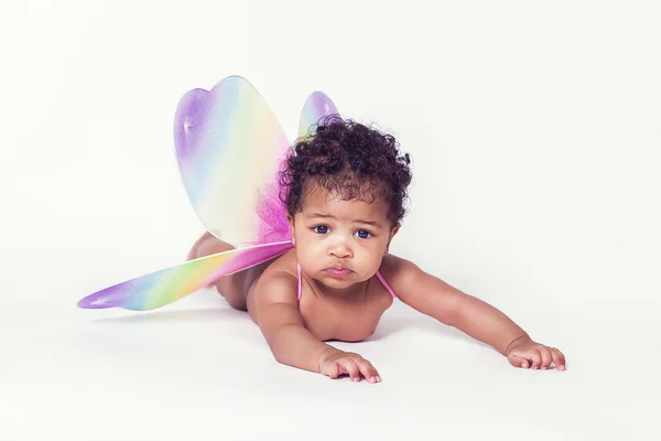 Lovely baby girl portrait wearing fairy wings — Stock Photo, Image