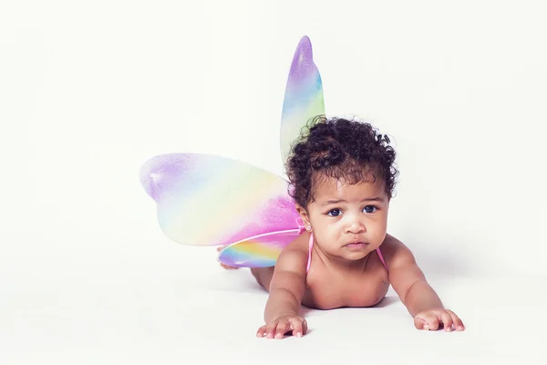 Szép baba lány portré visel színpompás tündér wings — Stock Fotó