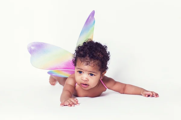 Pretty baby fairy portrait wearing colorful wings — Stock Photo, Image