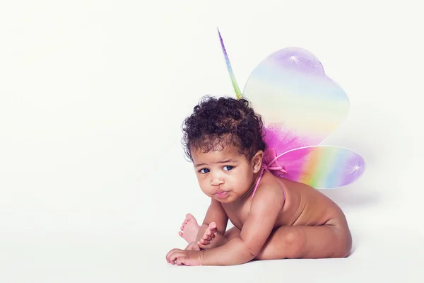 Lovely and funny baby girl portrait wearing fairy wings — Stock Photo, Image