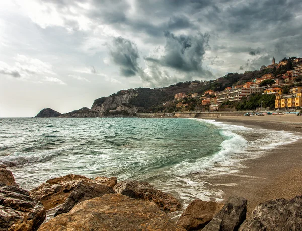 Italian seashore and rocks with stormy sky — Stock Photo, Image