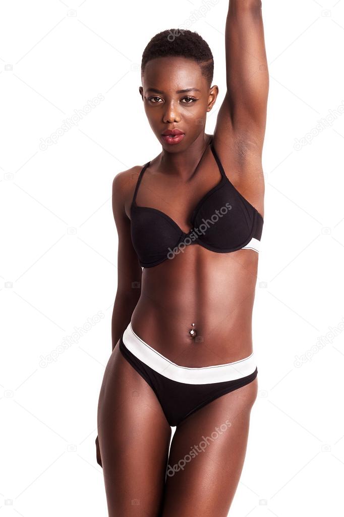 Gorgeous african model posing while wearing sporty lingerie Stock Photo by  ©patronestaff 116764514