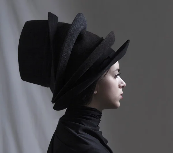 Lány több kalapot visel — Stock Fotó