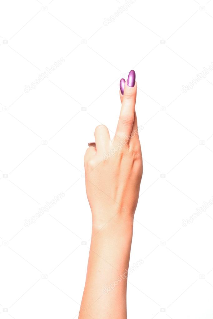 Woman hand making good luck gesture