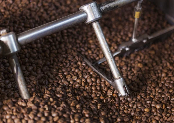 Coffee beans in the coffee roaster — Stock Photo, Image