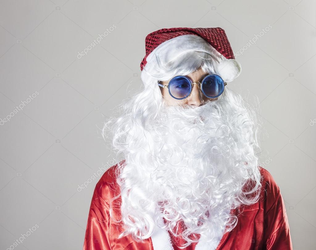 Santa Claus wearing blue sunglasses