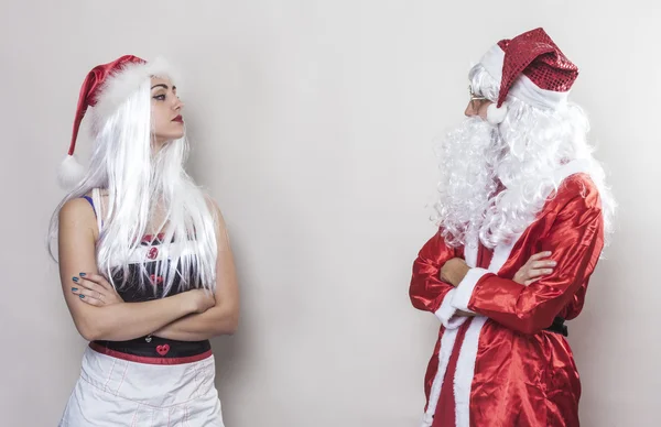 Argument between a girl and Santa Claus — Stock Photo, Image