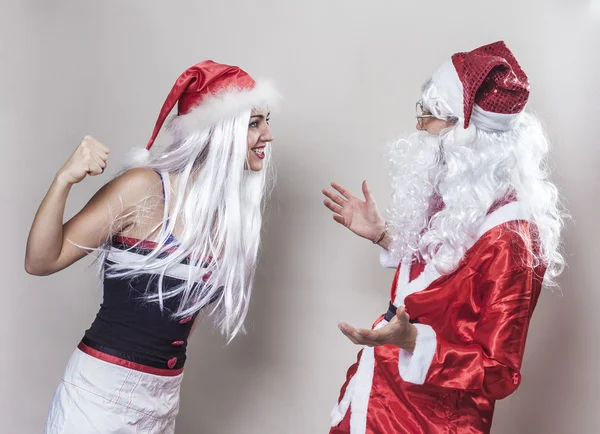 Joking girl against Santa Claus — Stock Photo, Image