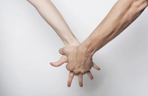 Hombre mano agarrando mano de mujer — Foto de Stock