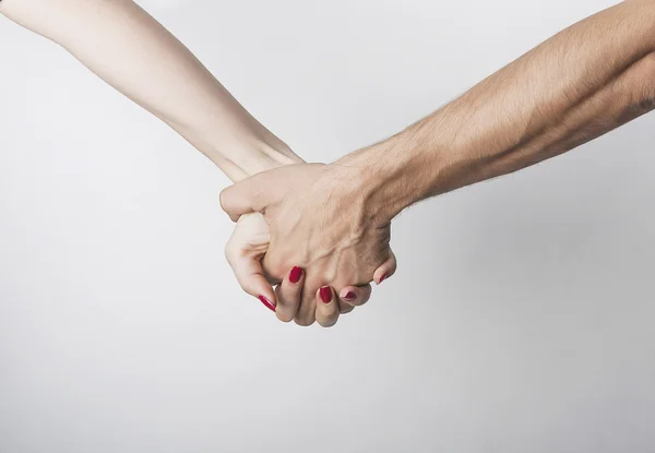 Mulher e homem de mãos dadas — Fotografia de Stock