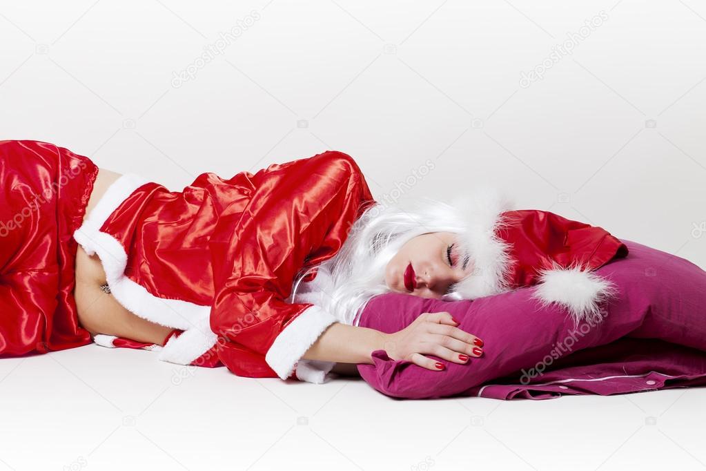 Tired Santa Claus sleeping