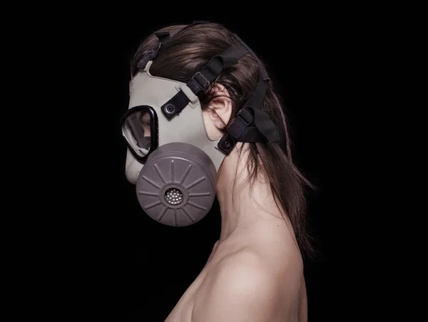 Beautiful girl wearing gas mask profile — Stock Photo, Image