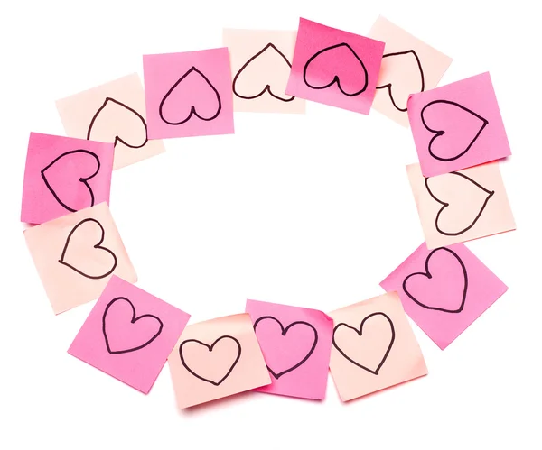 Post-it pink frame with drawn hearts — Stock Photo, Image