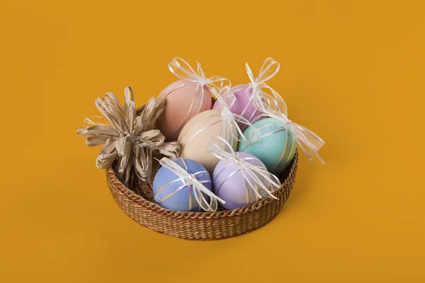Colorful Easter eggs with bows — Stock Photo, Image