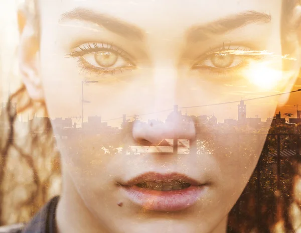 Double exposure of closeup girl portrait and cityscape — Stock Photo, Image