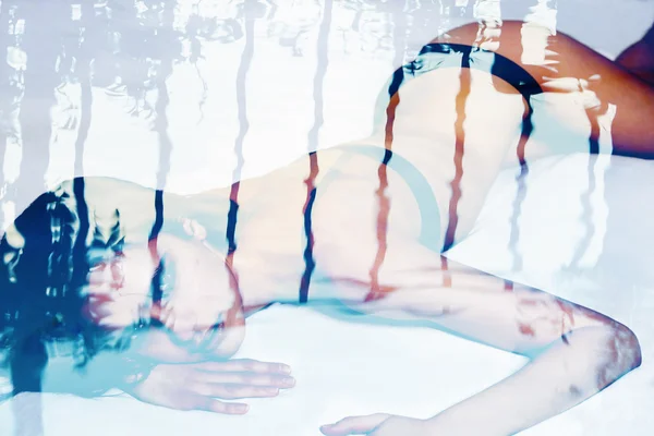 Double exposure of beautiful woman and abstract water reflection — Stock Photo, Image