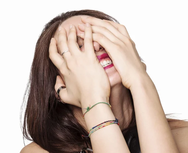 Girl hiding behind her hands — Stock Photo, Image