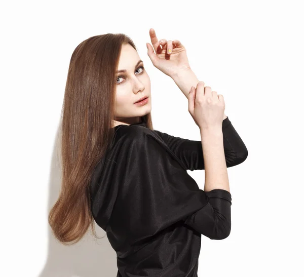 Model wearing black dress, posing and looking — Stock Photo, Image